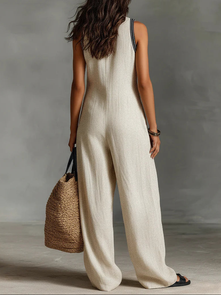 Rossana | Tuta Smanicata Minimal con Collo Alto e Zip