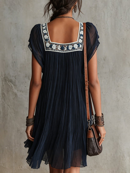 Apollonia | Mini Abito Plissettato in Chiffon Ricamato a Fiori Blu Navy